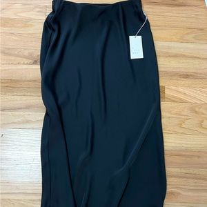 MIDI length black slip skirt